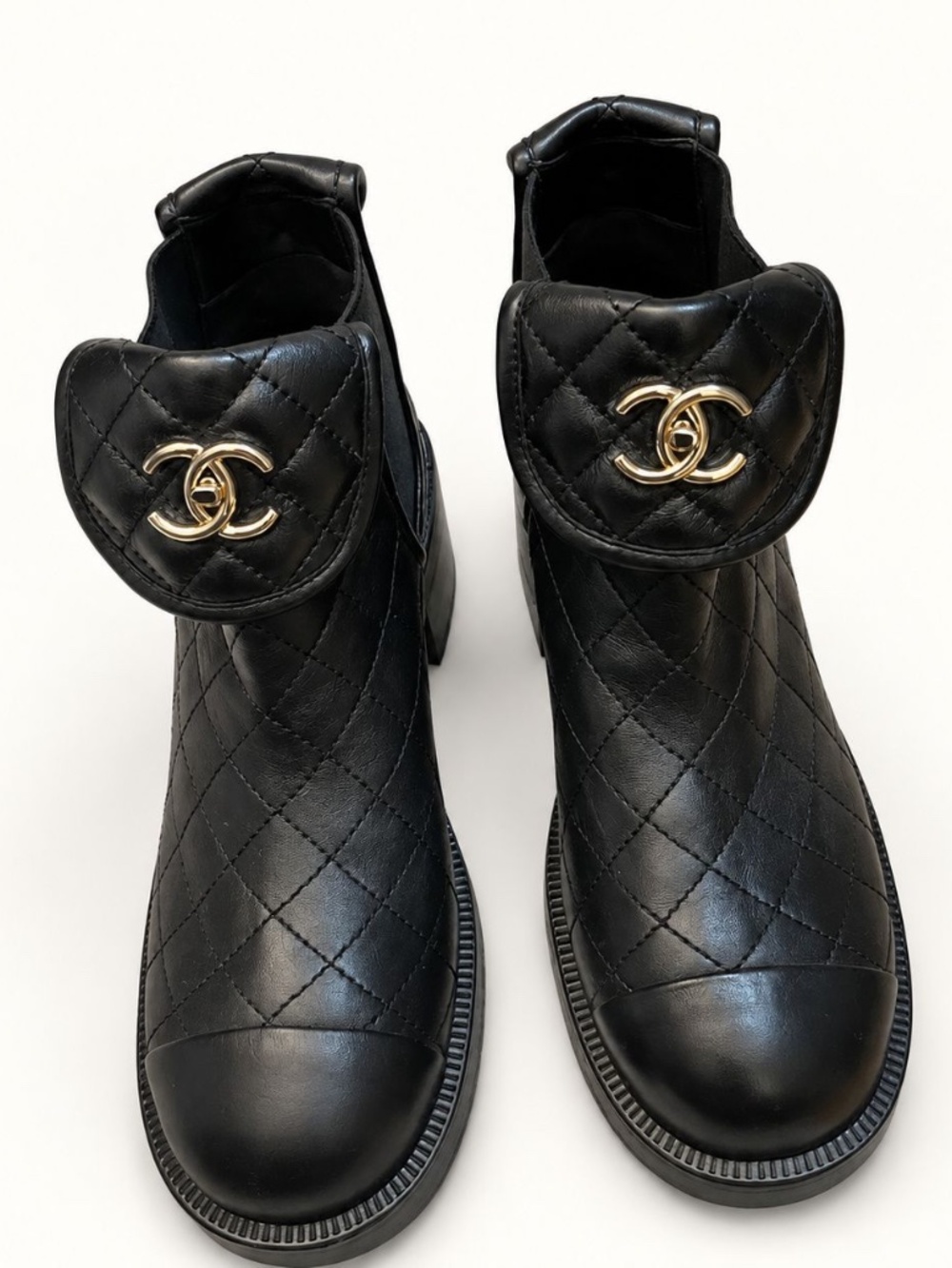 CHANEL Quilted Leather Turnlock Booties. Brand New